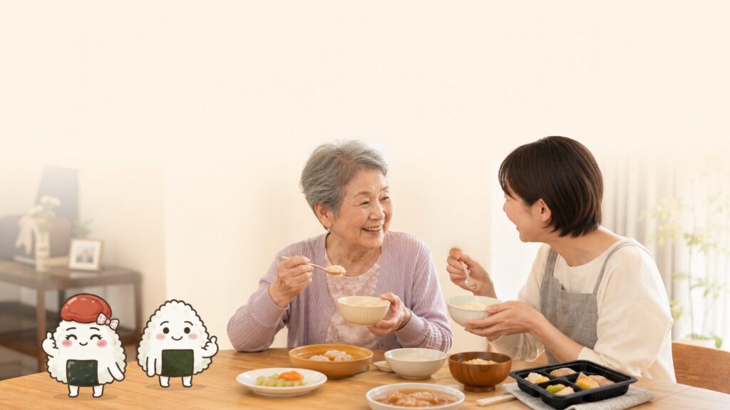高齢の女性と娘が食卓で一緒に食事をしている写真